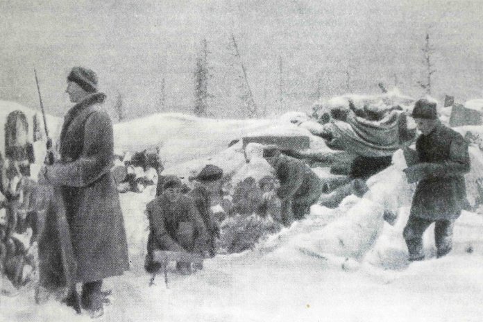 A historic image of American soldiers in snow.