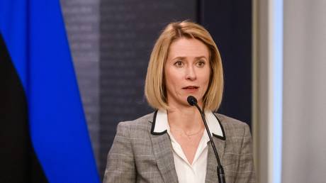 A person speaking into a microphone Description automatically generated